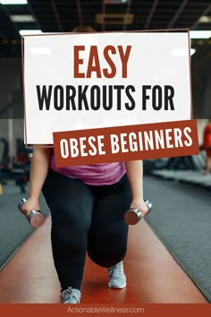 a woman holding a sign that says easy workouts for obese beginners on it