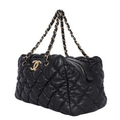 Authentic, pre-owned Chanel bubble quilted calfskin leather shoulder bag tote. Features black calfskin leather gold-tone hardware, dual leather woven straps, large CC at the front of the bag, and the interior lining has 3 compartments/pockets including a zippered compartment. Authenticity hologram stamp reads: 12899699 Made in Italy 2008-2009 Strap drop: 9" Quilted Leather Bag With Double Handle, Quilted Leather Satchel Bags, High-end Quilted Shoulder Bag For Everyday Luxury, Quilted Leather Shoulder Bag With Double Handle, Luxury Quilted Shoulder Bag For Everyday Use, Designer Quilted Top Handle Bag, Luxury Quilted Satchel Bag, High-end Quilted Bags For Formal Occasions, Luxury Quilted Double Handle Bag