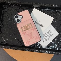 a cell phone case with a monogrammed louis vuitton logo on it