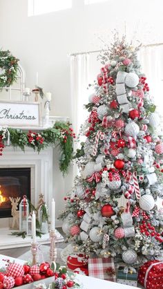 a christmas tree decorated with red and silver ornaments