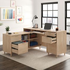 Give yourself the stylish workspace that the L-shaped desk with drawers from the Clifford Place® collection provides. Never run out of workspace – an L-shaped home office desk provides you with an abundance of tabletop space for all your office essentials like your laptop, important papers, notepads and much more! This home office desk features a slide out keyboard/mouse shelf that opens and closes on smooth metal runners. This L-shaped desk with storage includes three easy gliding standard drawers on metal runners, and two file drawers with full extension slides that accommodate letter-size hanging files. Cubbyhole storage allows for easy access and placement of books, bins and folders. The multiple grommet holes and pass-throughs allow you to keep all your cords and wires neat and out of L Shaped Desk With Storage, L Shaped Office Desk, L Shaped Executive Desk, Mid Century Modern Desk, Cubby Storage, Hanging Files, L Shaped Desk, Home Office Desk, Keyboard Mouse