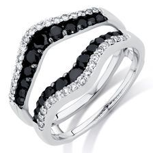 two black and white diamond rings on top of each other