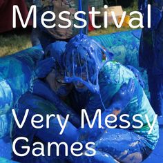 two people covered in blue paint sitting on top of an inflatable couch with text overlay that reads, festival very messy games