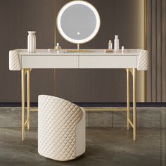 a white vanity with a round mirror and stool