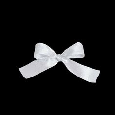 a white bow on a black background