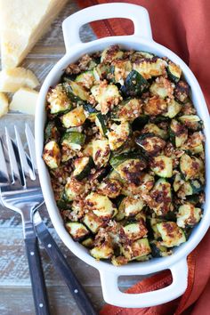 a casserole dish with zucchini and cheese