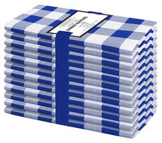 a stack of blue and white checkered napkins with a label on the top