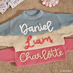 Custom Hand-Embroidered Baby Sweater This soft knit sweater is perfect for baby girls and boys. Personalized with your baby's name, it's a unique gift for any occasion! Material: Soft, comfortable knit Sizes: Available in various baby sizes Customization: Add your baby's name A cozy, custom sweater for your little one! Baby Name Sweater, Name Sweater, Baby Boy Sweater, Pull Bebe, Custom Sweaters, Custom Baby Gifts, Baby Sweater, Baby Boy Names, Baby Name