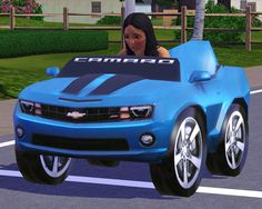 a woman driving a blue car in the street