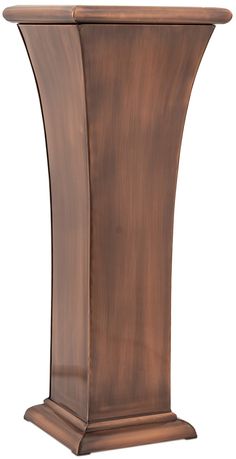 a tall wooden pedestal with an elegant design on it's sides and the base is made out of wood