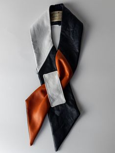 'emily' orange, navy & white leather scarf satin lining handmade in ireland one size dry clean only Leather Scarf, Schmidt, Navy White, White Leather, Scarf Wrap, Navy And White, Scarf Accessory, United Kingdom, Etsy Accessories