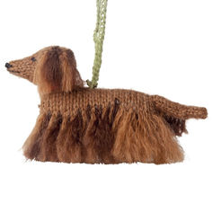 a brown dog ornament hanging from a rope