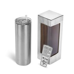 a stainless steel travel mug next to a cardboard box with a sticker on it