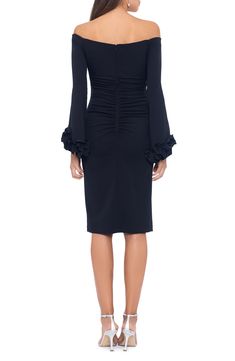 Give your curves a hug in this bell-sleeve dress with ruffled cuffs and gathered details in all the right places. 43" length Off-the-shoulder neck Long sleeves Lined 94% polyester, 6% spandex Dry clean Made in the USA Elegant Cocktail Midi Dress With Elastic Sleeves, Elegant Midi Dress With Elastic Sleeves For Night Out, Elegant Formal Midi Dress With Elastic Sleeves, Fitted Evening Midi Dress With Ruffle Sleeves, Evening Fitted Midi Dress With Ruffle Sleeves, Elegant Ruffle Sleeve Midi Dress For Date Night, Elegant Midi Dress With Ruffle Sleeves For Date Night, Elegant Stretch Midi Dress With Ruffle Hem, Elegant Midi Dress With Elastic Sleeves For Date Night