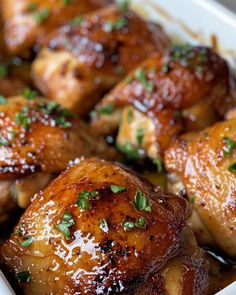 closeup of chicken thighs in a baking dish