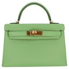 Brand: Hermès Style: Kelly II Sellier Mini Size: 20cm Color: Vert Criquet Material: Chevre Leather Hardware: Gold Hardware(GHW) Dimensions: 7.5" W x 4.5" H x 2.25" D Handle Drop: 3.25" Strap Drop: 18.5" Las Vegas Shopping, Mini Kelly, Hermes Style, Hermes Box, Kelly Bag, Leather Hardware, Hermes Paris, Hermes Handbags, Box Set