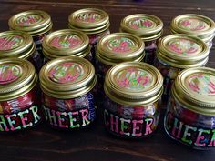 there are many jars with the words cheer on them