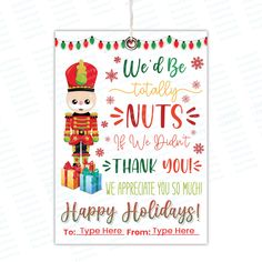 a christmas card with a nutcracker and presents hanging from the front of it