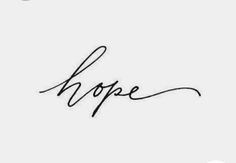 the word hope written in cursive handwriting