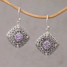 Shining openwork swirl motifs decorate these Balinese dangle earrings crafted of sterling silver by local artisans. They accent the corners with 18k gold surrounding sparkling amethyst stones in the centers. Accentuating any outfit these earrings are presented by Kadek Wijanegara. Fillagree Jewelry, Country Jewelry, Labradorite Earrings, Silver Dangle Earrings, Sterling Silver Dangle Earrings, Gold Accent, Floral Earrings, Silver Earrings Dangle, Earrings Dangle