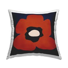 a black and red pillow with an orange flower on the front, sitting on a white background