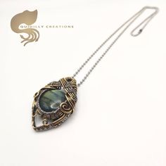 Adjustable Round Labradorite Necklaces, Adjustable Round Labradorite Necklace, Adjustable Labradorite Necklace, Artisan Labradorite Round Pendant Necklace, Artisan Labradorite Jewelry With Large Pendant, Artisan Labradorite Necklace With Large Pendant, Adjustable Wire Wrapped Labradorite Necklaces, Labradorite Necklace Wire Wrapping, Adjustable Wire Wrapped Labradorite Necklace