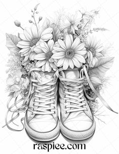 a drawing of a pair of sneakers with flowers on the bottom and laces around them