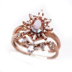 Dazzling Rose Gold Rings With Rose Cut Diamonds, Rose Gold Diamond Teardrop Ring, Rose Gold Teardrop Diamond Ring, Rose Gold Teardrop Wedding Ring With Prong Setting, Heirloom Rose Gold Cubic Zirconia Ring, Luxury Rose Gold Teardrop Rings, Teardrop Rose Gold Ring With Prong Setting, Rose Gold Teardrop Ring With Prong Setting, Rose Gold Teardrop Diamond Ring With Prong Setting