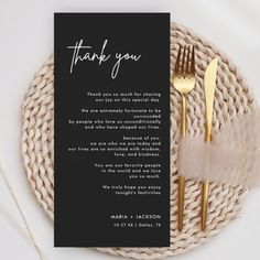 a black and white thank you card with gold forks on it next to a woven place setting