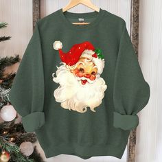 Retro Santa Sweatshirt, Vintage Santa Sweatshirt, Retro Christmas Santa, Holiday Clothing Women, Christmas Sweatshirt for Woman, holiday Suitable for many occasions such as Christmas, Father's Day, Mother's Day, birthday This classic crew-neck sweatshirt is an essential basic item for anyone’s wardrobe. The ribbed cuffs on the sleeves and waist are reinforced, and the high-quality cotton ensure that anyone will enjoy this cuddly and cool sweatshirt for many moons to come. Preshrunk fleece knit D Holiday Sweatshirts Lightinthebox, Holiday Clothing, Holiday Outfits Women, Santa Sweatshirt, Retro Santa, Letter Print Sweatshirt, Women Christmas, Sweatshirt Vintage, Vintage Santa