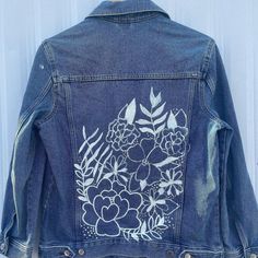 Thrifted and hand-painted denim jacket.  Size: Medium Original Brand:  H&M *All denim Jackets are thrifted, so sizing may fit differently due to previous washing and wear. I am happy to provide measurements if needed!  *Jackets are heat treated for machine washing, however hand washing is recommend! Painted Jean Jacket Flowers, Spring Cotton Denim Jacket With Graphic Print, Spring Denim Blue Jacket With Graphic Print, Spring Denim Jacket With Graphic Print, Spring Graphic Print Denim Jacket, Vintage Denim Jacket With Graphic Print For Spring, Vintage Graphic Print Denim Jacket For Spring, Spring Denim Jacket With Graphic Print And Relaxed Fit, Hand Painted Long Sleeve Denim Jacket For Spring