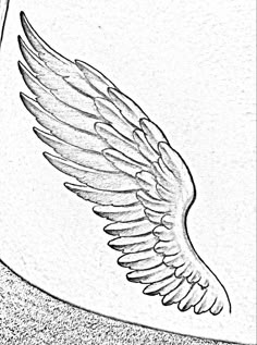 a drawing of an angel wing on the side of a car