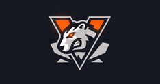 a wolf head with the letter v on it's face in grey and orange