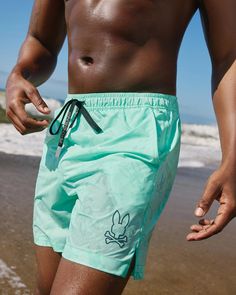 The men's Parker swim trunk has a hydrochromatic pattern that magically reveals itself when the quick-dry material is wet. Waterproof bag included in back pocket.Also available for KidsWoven - 100% polyester mechanical stretch, inside net 76% polyamide, 24% elastaneMade in ChinaSwimHydrochromicHydrochromic swim trunkColor-changing swim trunkWater-Activated bathing suitQuick-dry swim trunkBeach shorts Hydrochromic is a term used to describe a type of material that changes color when exposed to wa Block Fonts, Waterproof Bag, Waterproof Bags, Fun In The Sun, Beach Vibes, Mens Green, Beach Glass, Swim Trunk, Quick Dry