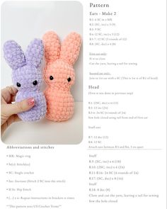 two crocheted rabbits are sitting next to each other, one is pink and the other is purple