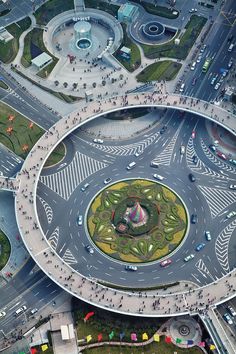 an aerial view of a busy intersection with lots of traffic