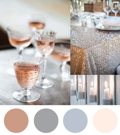 a table topped with wine glasses filled with liquid next to candles and plates covered in glitter