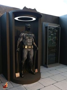 the batman statue is on display at the museum