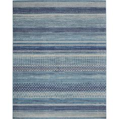 a blue and white rug with stripes on the bottom, in various sizes and colors