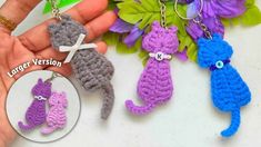 three crocheted keychains in the shape of cats with names on them