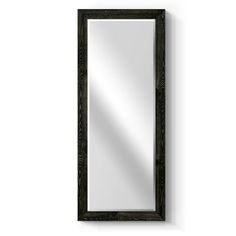 a black framed mirror hanging on the wall