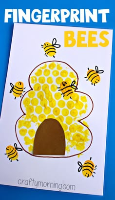 the fingerprint bee craft is made with bees and honeycombs on top of it