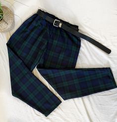 👖 These green tartan trouser is made using cotton blend material (polyviscose) These long trousers have a classic and vintage look thanks to the rich plaid patterns. Put on these relaxed trousers and you'll be ready to take on the world. They are ideal for matching shirts and T-shirts and are also ideal for weekend casual wear. ✅ MEASUREMENTS: * Hip: 36 waist: 24 - size 4 * Hip: 36 waist: 25 - size 6 * Hip: 38 waist: 26.5 - size 8 * Hip: 40 waist: 28 - size 10 * hip: 42.5 waist:30 - size 12 * Hip: 43.5 waist: 31.5 - size 14 * Hip: 45 waist 32.5 - size 16 * Hip: 46 waist: 33.5 - size 18 ✅ FEATURES: ⦿ Made using cotton blend ⦿ A classic and vintage look ⦿ Ideal for matching shirts ⦿ A relaxed fit for men and women  ✅ SPECIFICATIONS: ⦿ Item Type: Tartan Trouser ⦿ Material: Cotton Blend ⦿ Sty Plaid Pants Outfit, Tartan Trousers, Tartan Clothing, Tartan Pants, Check Pants, Trouser Outfit, Relaxed Trousers, Green Tartan, Womens Trousers