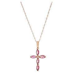 This luxurious necklace is a testament to top-quality craftsmanship and materials, presenting a unique blend of 14KT rose gold, a total of 1.33 carats of marquise-cut pink tourmaline, and a shimmering round-cut diamond as its centerpiece. The combination of the warm rose gold, vibrant pink tourmaline, and the sparkle of the diamond creates a stunning and harmonious design, making this necklace a statement of elegance and sophistication. It's a perfect accessory to add a touch of luxury to any en Luxury Rose Gold Cross Jewelry, Luxury Rose Gold Cross Necklace, Luxury 14k Gold Pink Necklace, Rose Gold Cross Pendant Fine Jewelry, Rose Gold Diamond Cross Pendant Jewelry, Rose Gold Pendant Necklace, Rose Gold Bar, Beautiful Pendant Necklace, Wave Necklace