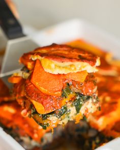 a close up of a plate of food with broccoli and cheese on it