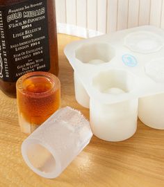 an assortment of ingredients for making ice cubes on a table