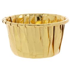 a gold colored metal bowl on a white background