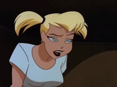 a woman with blonde hair and blue eyes looking at something