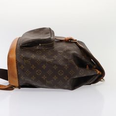 Brand: Louis Vuitton Model: Montsouris Color: Brown Material: Canvas Inclusions: / Dimensions: W31cm x H39cm x D13cm / Shoulder Drop:30 - 33cm Serial number: MI0975 Country of origin: France Condition: AB - good condition. The Louis Vuitton "Montsouris" backpack is a classic piece crafted from iconic Monogram Canvas in a rich brown hue. This stylish backpack embodies Louis Vuitton's esteemed craftsmanship and sophisticated design, making it a timeless choice for any wardrobe. The backpack exhibi Designer Brown Bag For Trips, Designer Coated Canvas Satchel Backpack, Luxury Backpack For Trips, Monogram Canvas Bag With Leather Backing For Everyday Use, Monogram Canvas Rectangular Backpack For Everyday Use, Rectangular Monogram Canvas Backpack For Daily Use, Designer Backpack With Leather Trim For Daily Use, Standard Monogram Canvas Backpack, Monogram Canvas Backpack