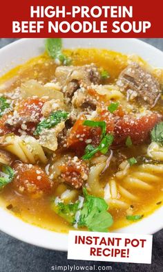 a white bowl filled with pasta and meat soup